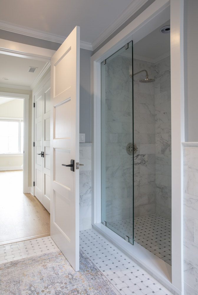 Water Hole blue door welcomes you. Build by Bruce Helier Builders.