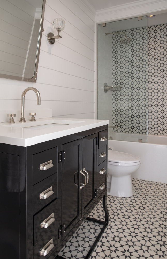 Water Hole blue door welcomes you. Build by Bruce Helier Builders.