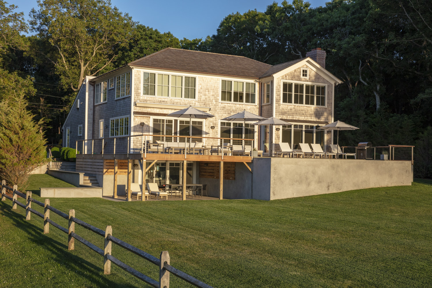 Water Hole blue door welcomes you. Build by Bruce Helier Builders.